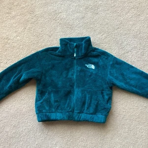 THE NORTH FACE MÄDCHEN 10-12 CROPPED FLEECE REISSVERSCHLUSS VORNE JACKE, LOGO VORNE, ZWEI TASCHEN - Bild 1 von 5