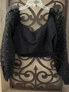 Top corto Zara negro usado en excelente estado con mangas de leopardo globo de organza transparente M - Imagen 1 de 5