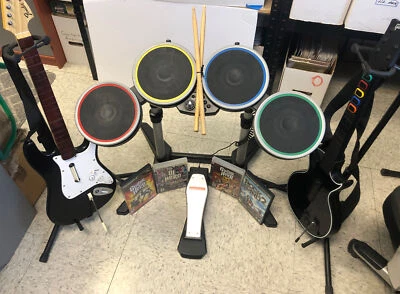 PS 2 & 3 Rock Band Guitar Hero Instruments & Game bundle (No Dongle Or Dj Mixer) - Image 1 of 4