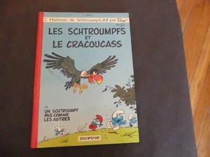 PEYO LES SCHTROUMPFS N°5 LES SCHTROUMPFS ET LE CRACOUCASS EO 1969 DOS ROND (1) - Imagen 1 de 7