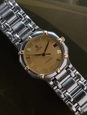Concord Swiss Saratoga Quarz 30mm Unisex Stahl/Gold Armbanduhr Ref.14.15.247/1 - Bild 1 von 4