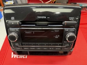 Toyota Tacoma 2012 OEM de fábrica AM FM radio auxiliar MP3 reproductor de CD receptor A518B3 - Imagen 1 de 12
