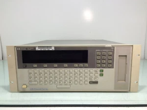 HP Agilent E1301B B-Size VXI 9 slot mainframe con modulo multimetro E1326B - Foto 1 di 7
