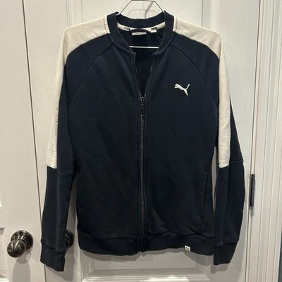 Chaqueta negra Puma talla pequeña con detalles blancos cremallera con bolsillos peso medio Foto 1 de 4