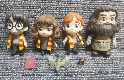 Juego de 4 figuras y accesorios de vinilo Harry Potter Funko 5 estrellas  Foto 1 de 4
