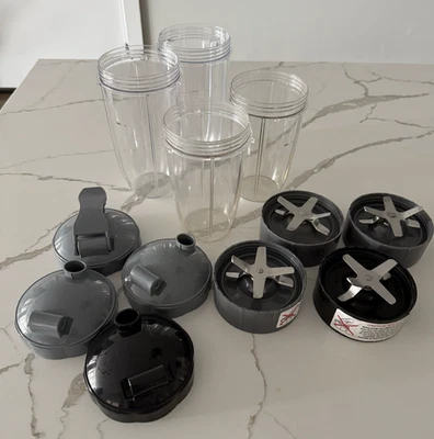 NutriBullet Set of 12 Extractor Blade 24oz 32 oz Cup Flip Top Lid - Image 1 of 4