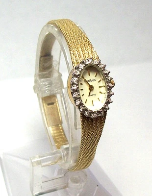 Reloj de cuarzo E.Gluck Armitron con diamantes genuinos y oro para dama años 80 se adapta a 6-7,25" Foto 1 de 4