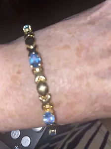Pulsera de topacio azul X y O de 14 K 7"" y 6,94 gramos con broche de garra de langosta - Imagen 1 de 4
