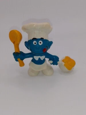 De colección. Figura de PVC Pitufo Cook/Chef 1977 con cuchara y olla 20073 Peyo Bully HK Foto 1 de 4