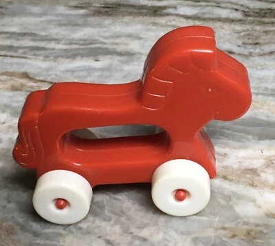 Sonajero bebé Gerber caballo rojo sobre ruedas blancas 1986 vintage Foto 1 de 4