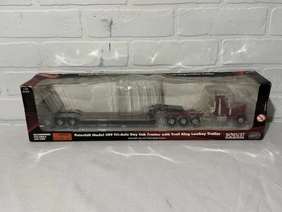1:50 Norscot Peterbilt 389 Tri-Axle Trail King Lowboy Flatbed Equipment Trailer - Image 1 of 4