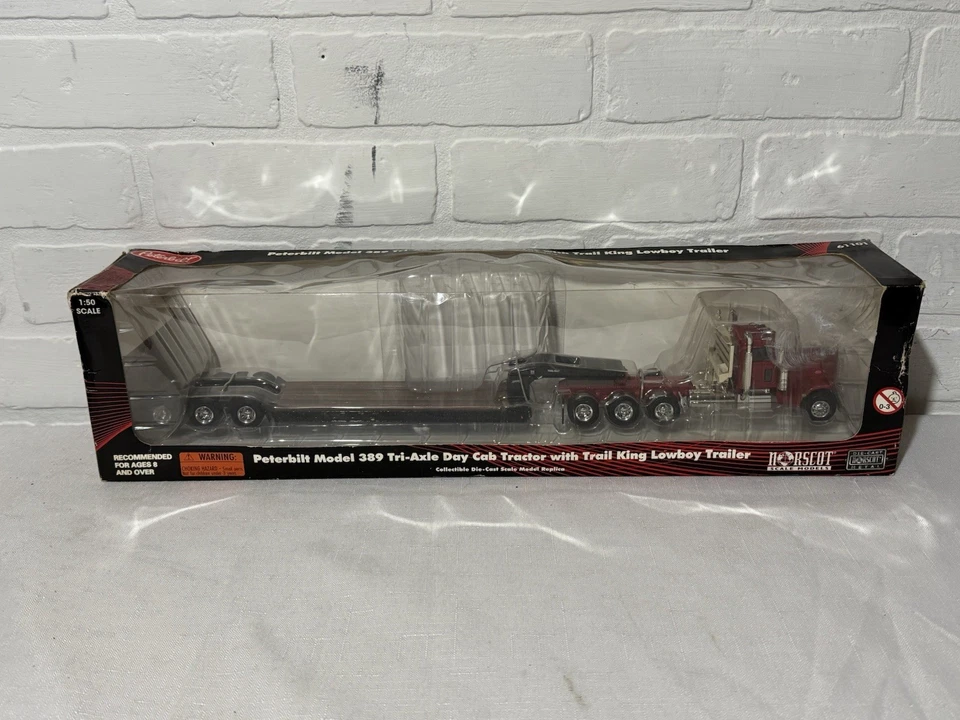 1:50 Norscot Peterbilt 389 Tri-Axle Trail King Lowboy Flatbed Equipment Trailer - Image 1 of 4