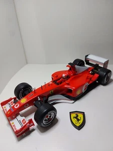 FERRARI F2002 #1 MICHAEL SCHUMACHER 2002 FORMULA 1 HOT WHEELS ESCALA 1:18 - Foto 1 di 9