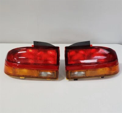 Par de luces traseras Sohc 1991-1992 Saturn SL SL1 4 puertas sedán 21095161 y 21095162  Foto 1 de 4