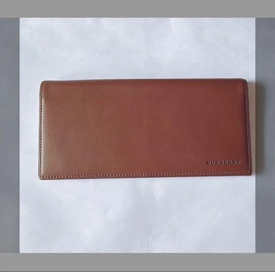 Cartera larga plegable de cuero marrón Burberry para hombre accesorio original de colección Foto 1 de 4
