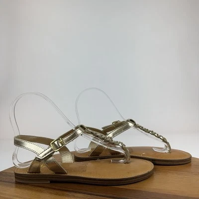 Nuevas Sandalias Grandes Niños Niñas Mia Annae Dorado Imitación Cuero Trenzado T-Correa Talla 4 Y Foto 1 de 4