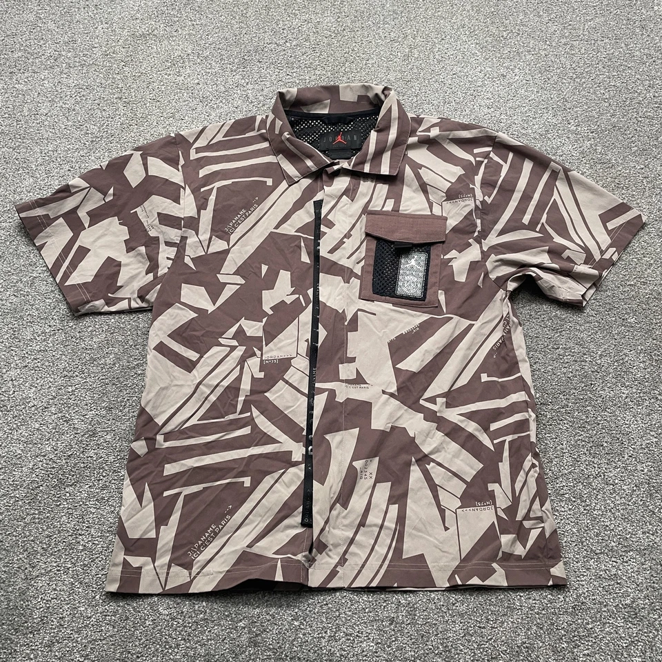 Camisa Jordan Paris Saint-Germain Para Hombre Botón Pequeño Manga Corta Fútbol Nylon Foto 1 de 4