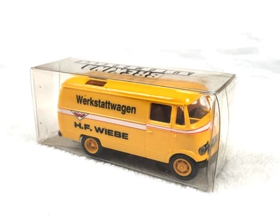 Vagón de taller Brekina Mercedes L319 H.F. Wiebe HO 1:87 - furgoneta amarilla - Alemania Foto 1 de 4