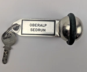 Vintage Heavy Metal Hotel Room Key Fob Oberalp Sedrun Switzerland Collectible - Picture 1 of 6