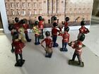13 very old 1/32 unknown makes, painted metal marching Household Guards Bandsmen