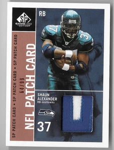 SHAUN ALEXANDER 2003 UD SP GIOCO USATO PATCH CARD #64/99! - Foto 1 di 1