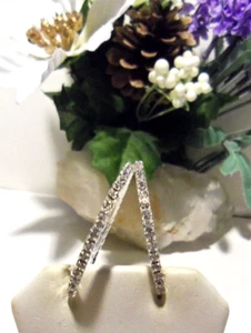 Silver tone hoop earrings with clear CZ's. - Picture 1 of 5