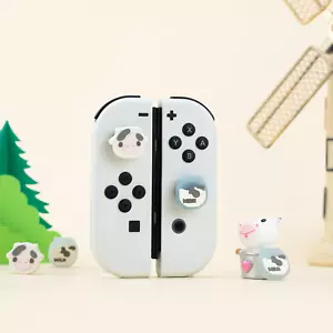 GeekShare Daumengriff Joystick Kappe für Nintendo Switch/Switch Lite/Oled Milch Kuh - Bild 1 von 11