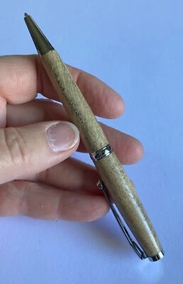 Bolígrafo giratorio de madera naranja torneado a mano borde cromado recargable KP-57 Foto 1 de 4