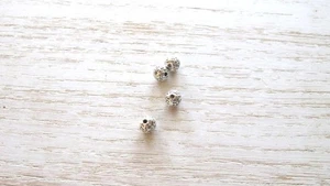 Konvolut 10 versilberte Metallperlen graviert 7 mm - Bild 1 von 1