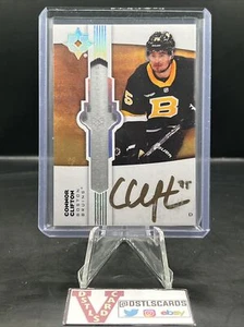 22/23 Ultimate Collection - CONNOR CLIFTON EMBLEMS ROOKIE AUTO #UE-CF - Bild 1 von 3