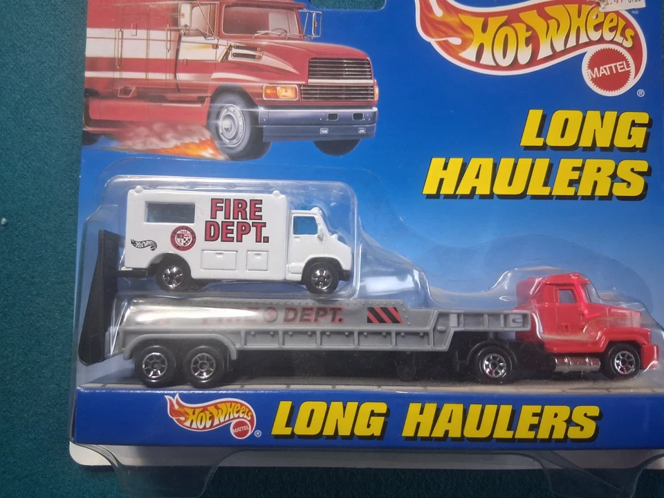 Camión de transporte de larga distancia Hot Wheels 1998 con ambulancia departamento de bomberos Foto 1 de 4