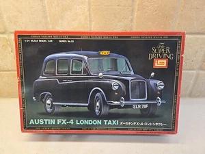 IMAI Austin FX-4 London Taxi The Super Driving Series Maßstab 1:24 versiegelt innen! - Bild 1 von 7
