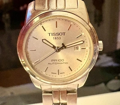 Reloj Tissot para mujer PR 100 automático esfera plateada Foto 1 de 4
