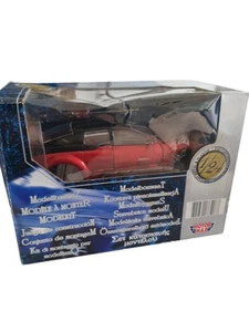 Pontiac Rageous in metallic red, 1:24 scale diecast model, Motormax - Picture 1 of 5