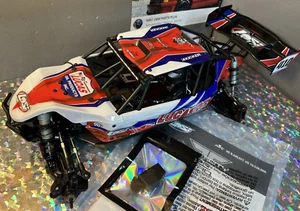Losi 1/10 Tenacity DB Pro Desert Buggy Brushless Lucas Blue Red Roller Chassis - Picture 1 of 8