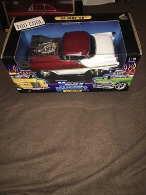 Muscle Machines 1:18 '56 Olds 88 - Red and White - Image 1 of 4