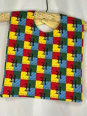Babero para bebé o niño pequeño - Hogwarts Harry Potter estampado Hufflepuff Foto 1 de 4