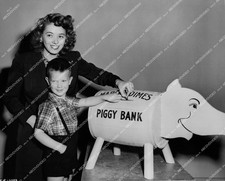 crp-57885 1944 Jeff Donnell w son Michael Phineas and March of Dimes piggy bank