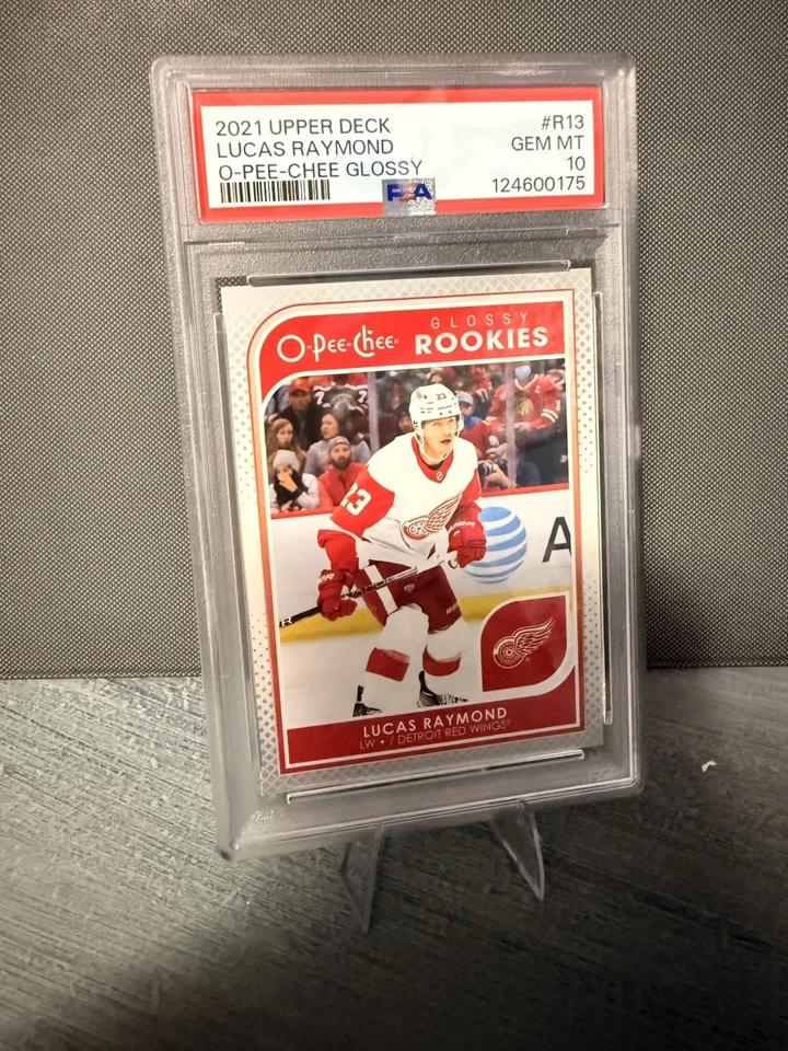 2021-22 Upper Deck Series 2 - O-Pee-Chee Glossy Rookies Lucas Raymond #R-13 (RC) - Image 1 of 1