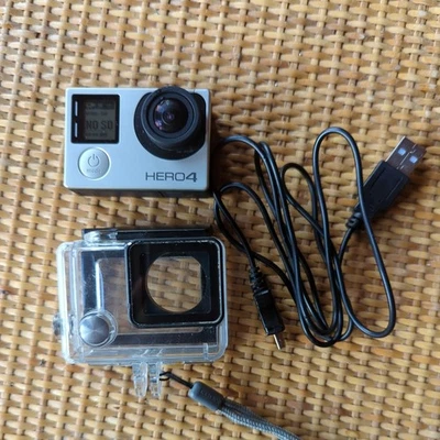 GoPro HERO4 Action Camera - Silver with Waterproof Housing and charging cable - Image 1 of 4