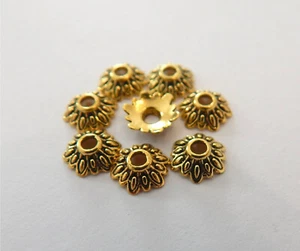 100 Perlenkappen gold antik 7mm klein verziert 7x2mm Metall Kappe - Bild 1 von 3