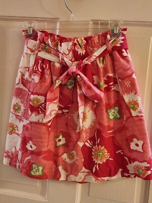 FALDA DE ALGODÓN LILLY PULITZER AVERY ROSA FLORAL, FORRADA CON BOLSILLOS/CINTURÓN TALLA XS Foto 1 de 4