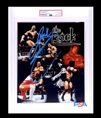 FOTO DE LUCHA LIBRE 8X10 FIRMADA POR WWE THE ROCK ENCAPSULADA POR CERTIFICADO DE AUTENTICIDAD PSA CON PRUEBA 3 Foto 1 de 4