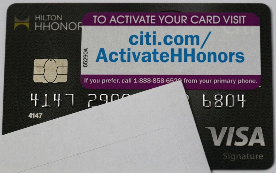 Expired Citi Hilton Hotel Visa Signature Credit Card with Sticker - Image 1 of 1