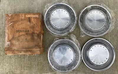 Tapacubos cubiertas rueda Mercury Cyclone Montego 14" NOS 1970-71 en caja original Foto 1 de 4