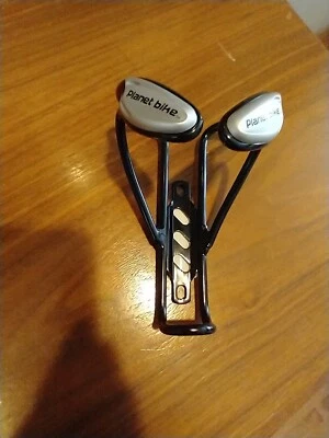 Jaula para botellas de agua vintage Planet Bike aleación negra  Foto 1 de 4