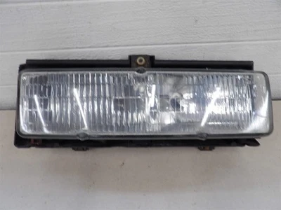 CUTLASS SUPREME FWD 1988-1991 CONJUNTO DE FAROS DIESTRO CON SOPORTE DE MONTAJE OEM Foto 1 de 4