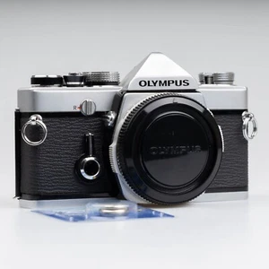 SERVICED Olympus OM-1 Body w Cap Chrome Classic 35mm Film Camera Zuiko NEW SEALS - Photo 1 sur 21