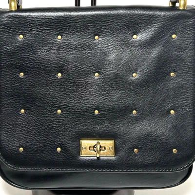 Fósil de colección. Cartera Bandolera Y2K con Solapa Cuero Negro con Tachuelas Doradas Cierre Giratorio Foto 1 de 4