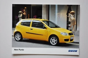 Foto de prensa de coche - Fiat punto - amarillo - vista lateral - Imagen 1 de 1
